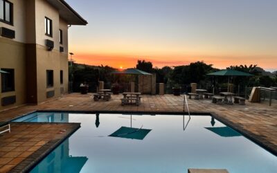 Hampshire hotel blue swimming pool with beautiful sunset